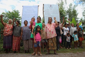 Baw Kaew villagers recently celebrated the fifth anniversary of their community’s re-establishment. Standing in front of their eviction notice, villagers intend to continue to fight peacefully for their land. Photo credit: Wilder Nicholson, Bowdoin College 