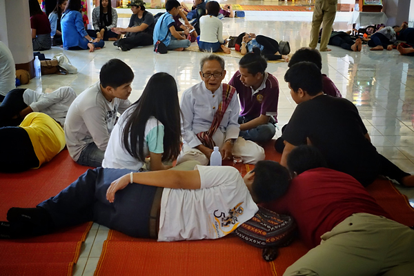 Students from Rajabhat Sakon Nakhon University listen Comrade Tang talk about the political history of Nabua.