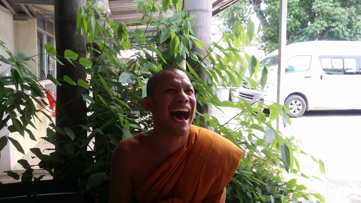 Molam performer Patiwat Saraiyaem, known as Bank, was ordained as a monk for his mother's sake after serving time for 2 years for a lese majeste violation. Now he laughs, “I am happy. I should be happy out of prison.”